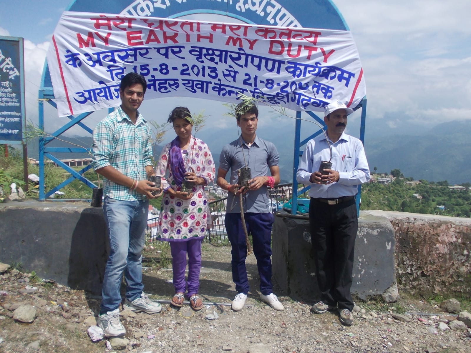 Youth volunteers with saplings at a My Earth My Duty tree-plantation program organized by Nehru Yuva Kendra, Tehri Garhwal